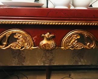 Detail on gilded red French altar table