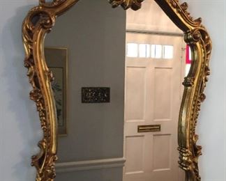 Gilded Mirror in unusual shape.