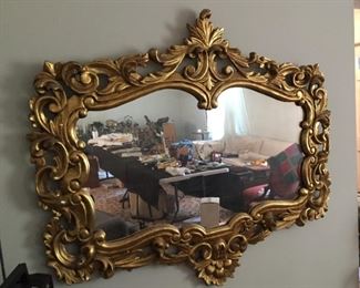 Gilded Mirror in unusual shape.