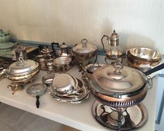 Large selection of silver plate cookware.