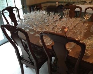 Beautiful Henredon  Table and Chairs and large assortment of glassware.