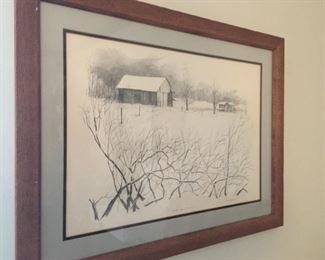 Framed black and white etching.