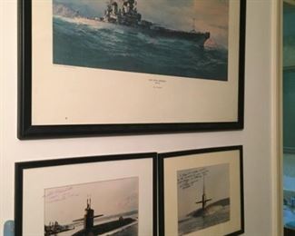Framed ship pictures.