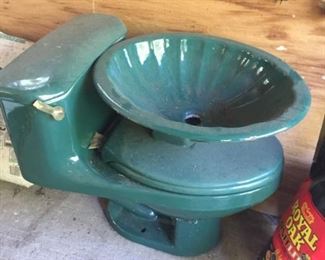 Green Toilet and sink.