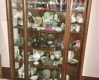 Antique curio cabinet w/ ball & claw feet, antique & vintage glassware and porcelain collectibles