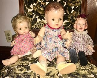 Vintage dolls, one on right has metal leg with flexibile extremities 