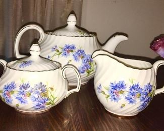 Porcelain teapot, sugar and creamer