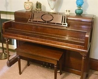 Exceptional Grinnell piano w/ rounded top and piano bench, porcelain & glass collectibles, large vase and biscuit jar are SOLD