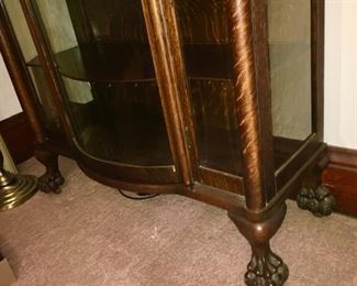 Large Claw feet on antique china cabinet