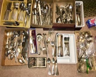 3 stainless steel flatware sets, misc Silverplate serving pieces and several sterling silver items