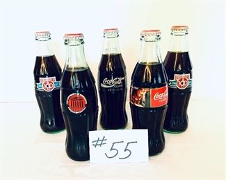 A lot of five Coca-Cola classic bottles 
7.5 inches tall lot price $30