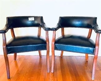 Pair of black “leather like”  armchairs with nail heads 24.5 inches wide by 29 inches tall $300