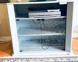 Gray TV cabinet 
34 inches wide by 18.5 inches deep by 30 inches tall $100