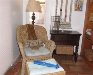 Rattan/wicker chair with ottoman and cushions