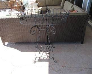 Iron scroll work plant stand