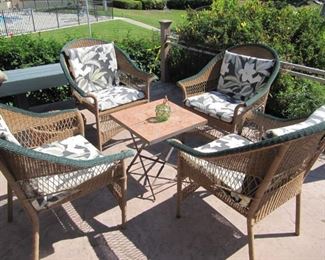 Seating for four!  Wicker/Rattan set of four chairs. Clay tile table sold separately