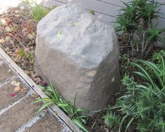 Fake rock to cover your outdoor pipes 