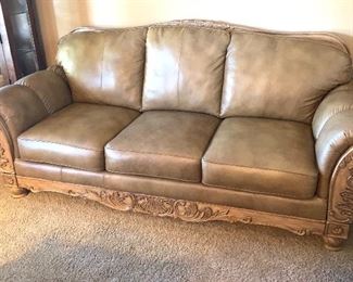 Ashley Furniture Traditional Wood Accent Leather Loveseat Sofa	42x72x39in	HxWxD