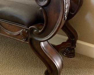 Upholstered Leather Bench with Hand carved wood	23x50x19	HxWxD