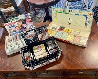c.1961, the original MONOPOLY Game, c.2008 Star Wars MONOPOLY Game, and c.2012 Millionaire MONOPOLY, all with original pieces. We have additional vintage Board Games and Puzzles for sell as well. 