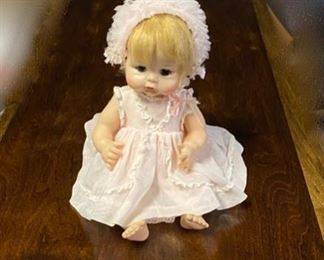 c.1965, "Madame Alexander" Baby Doll in Pink Chiffon Dress and Bonnet, Blonde Hair, Dark Eyes that Blink. We also have other toys and dolls to sell...