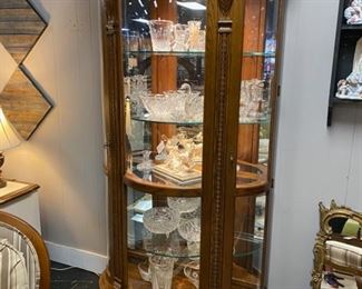 Beautiful, Solid Oak, Bowed Front, Lighted Display Cabinet with Glass Shelves, and Carved Top, Side Pieces, and Feet