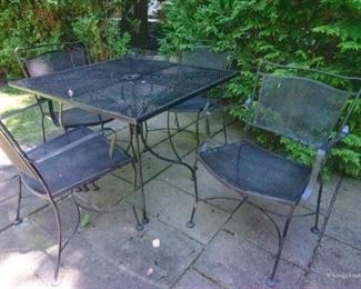 Metal Outdoor Table with 4 Armchairs  $225