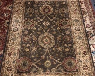 Hand-knotted wool rug, approximately 4' x 6'   $125   Brown, dark green, deep red, beige colors.  Excellent condition