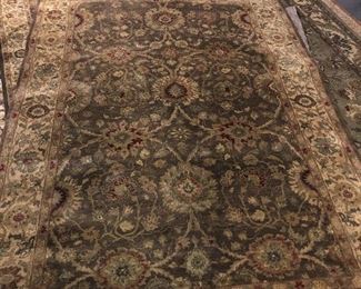 Hand-knotted wool rug, approximately 5' x 8'   $165   Brown, dark green, deep red, beige colors.  Excellent condition, matches 4'x6'