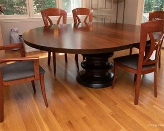 Exotic Woods Pedestal Dining Table $550
80.25 x 60 x 30.75 (shown with leaf in), without leaf, the table is 60" round