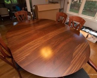 Exotic Woods Pedestal Dining Table $550
80.25 x 60 x 30.75 (shown with leaf in), without leaf, the table is 60" round