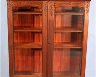 041a Eastlake walnut Victorian 2 door bookcase with drawer, 69.5 in. T, 43 in. W, 15.5 in. D.  