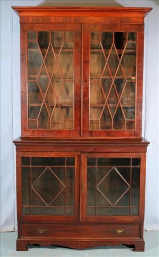 059a Flame Mahogany Empire breakfront with individual glass panels, 2 piece, 88 in. T, 48 in. W, 19 in D.