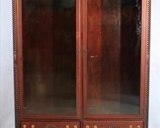 112a Mahogany 2 door bookcase with 2 botom drawers, ball and claw feet, perfect for gun case, 55 in. T, 53 in. W, 16 in. D.