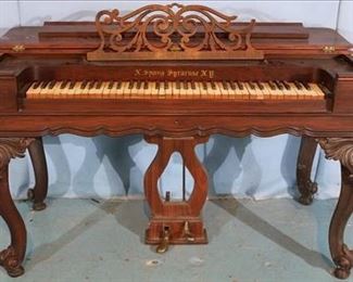 098a Rosewood Empire pump organ, heavily carved knees on legs, signed Xavier Spang, Syracuse, N.Y., 32 in. T, 54 in. W, 24 in. D.