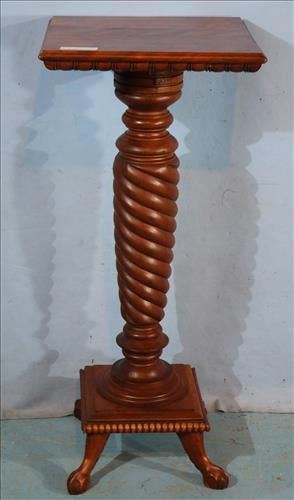 120a Mahogany pedestal with twisted column and claw feet, 37 in. T, 16 in. W.