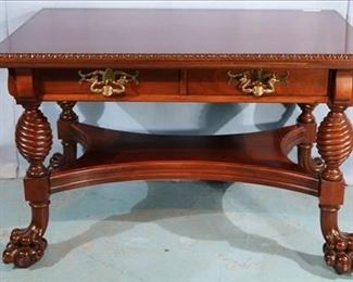 129a Mahogany Hunzinger library table with extra large feet, 30 in. T, 46 in. W, 30 in. D.