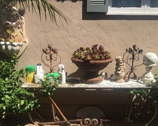 Large and gorgeous outdoor table, more outdoor wall and ground decor & artistic potted succulents. 