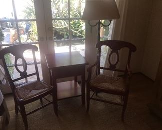 Red wood chairs and table and lamp. All furniture is In amazing shape. 