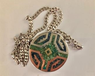 $100  Detail  Pendant 1 and 3/4 inches in diameter 