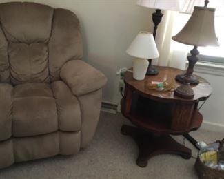 360 degree swivel, rocker recliner.  Lamps. Vintage end tables and Pedestal tables