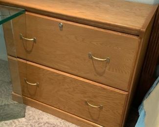 https://connect.invaluable.com/randr/auction-lot/two-drawer-wood-file-cabinet_98248A0BFD