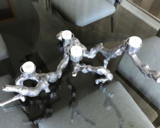 Pair of iron abstract candle sticks. $100 each