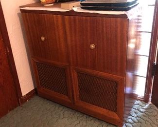 Antique record cabinet.  We have a large selection of records!
