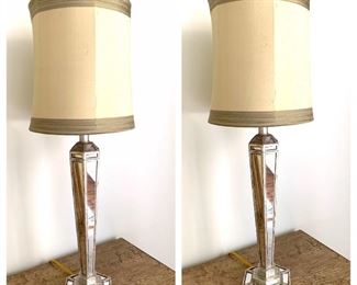 matching pair of mirrored lamps