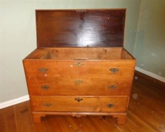 Chippendale period lift top blanket chest with one drawer.  Rat tail hinges on lift top. Brasses have been replaced at some time.