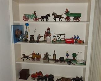 lots of cast iron banks and cast iron toys and vintage banks & toys