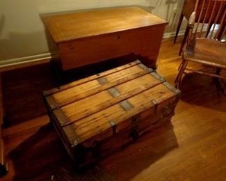 Old flat top wood trunk and antique lift top blanket chest.