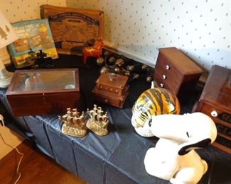 Tiger & Snoopy cookie jars, bronze ship book ends, minature dresser & other items