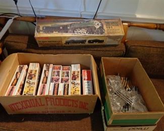 Lionel 4-8-4 Great Northern engine, track, and Lionel cars still in boxes. Also another Lionel set not shown